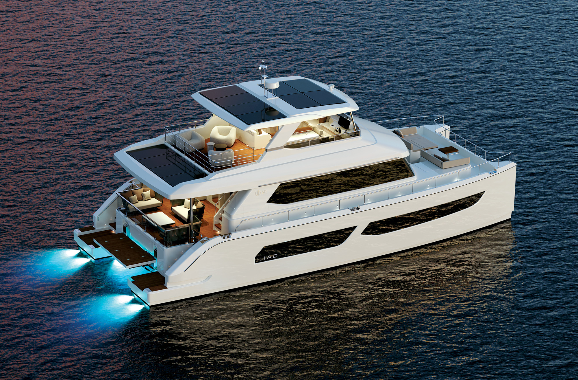 A high-angle, overhead rendering of a luxurious, modern white ILIAD 60 power catamaran cruising at dusk. The multi-deck vessel features large solar panels integrated into its upper hardtop roof and aft awning cover. The aft cockpit and open flybridge area are elegantly furnished with outdoor lounge chairs and sofas. Bright blue underwater LED lights glow vividly beneath the swimming platform at the stern, casting a vibrant reflection onto the calm dark water.