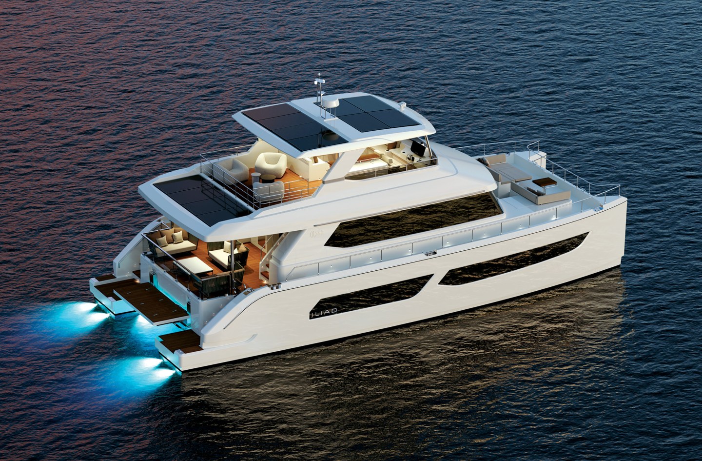 A high-angle, overhead rendering of a luxurious, modern white ILIAD 60 power catamaran cruising at dusk. The multi-deck vessel features large solar panels integrated into its upper hardtop roof and aft awning cover. The aft cockpit and open flybridge area are elegantly furnished with outdoor lounge chairs and sofas. Bright blue underwater LED lights glow vividly beneath the swimming platform at the stern, casting a vibrant reflection onto the calm dark water.