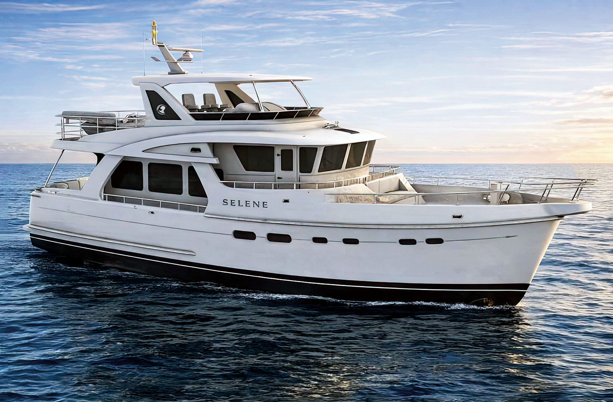 A profile view of a white Selene 52 Ocean Explorer trawler yacht cruising on calm blue open water under a bright sky.
