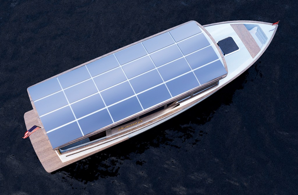 An overhead aerial rendering of the Townsend 34 solar electric cruiser on dark water, highlighting the large array of solar panels integrated across its long rooftop deck.