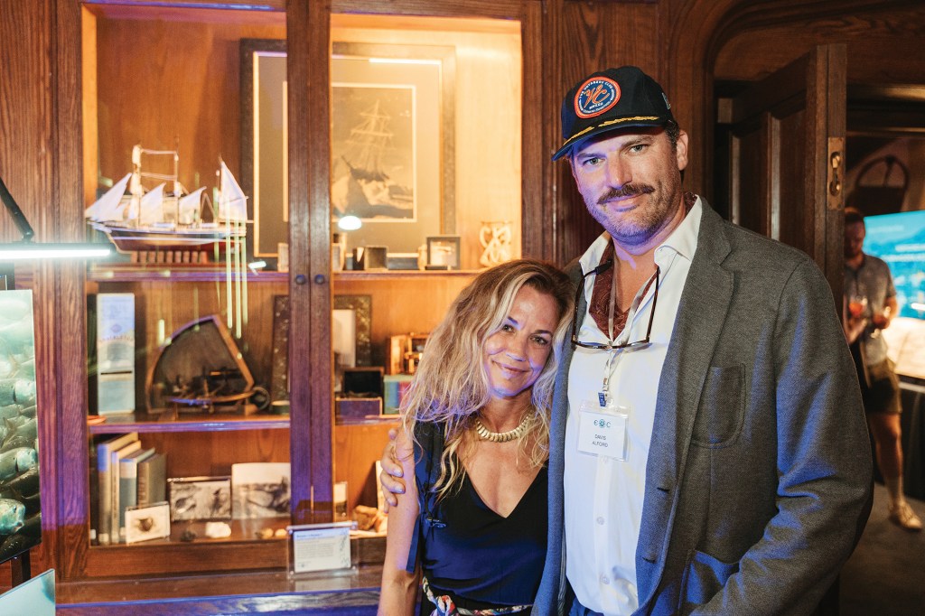 Leila Davenport Ross and Captain S. Davis Alford inside the historic Robert Gray ship library.